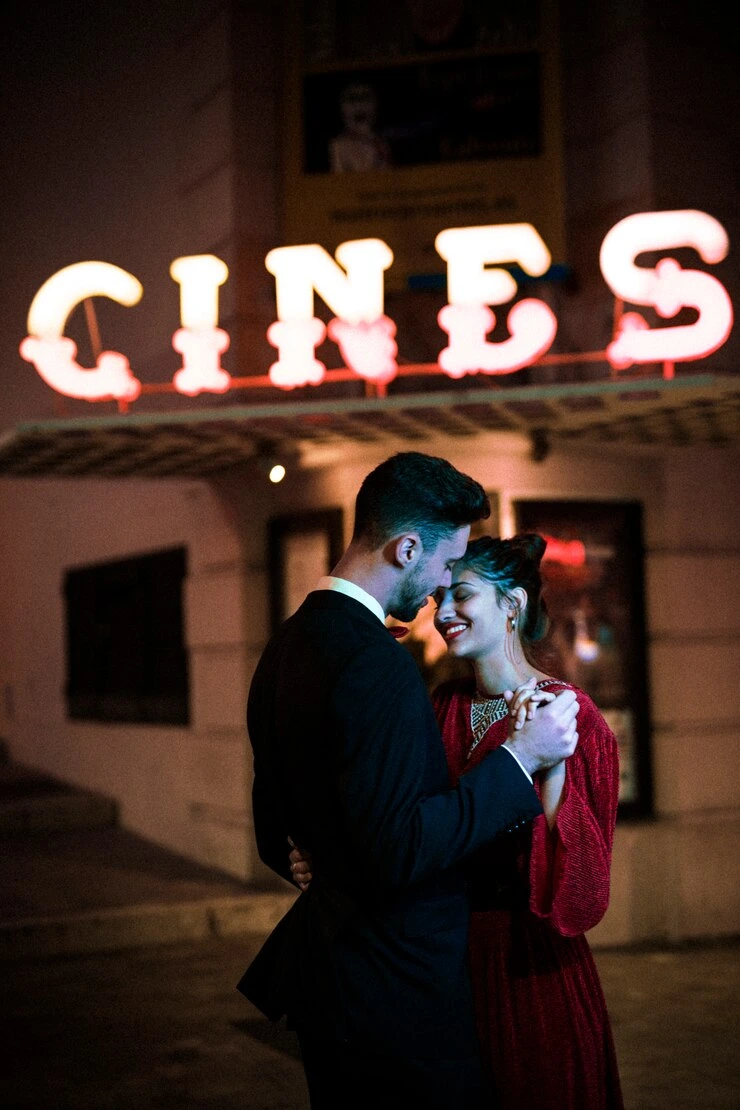 520420384066740_tmp_beautiful-happy-woman-holding-hands-with-young-man-street_23-2148012611